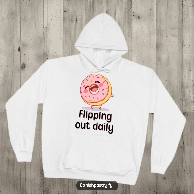 Funny hoodie featuring a laughing donut adorned with sprinkles, performing a funny somersault, a cozy and comical design.