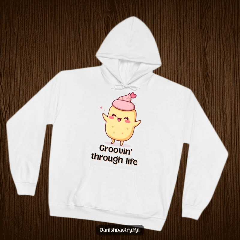 Funny hoodie featuring a giddy scone character doing a little shimmy, designed for warmth and spreading cheerful baking amusement.