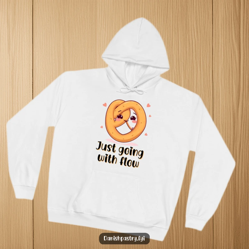 Funny hoodie featuring a happy pretzel character twisting playfully, designed for warmth and spreading cheerful, snack-themed amusement.