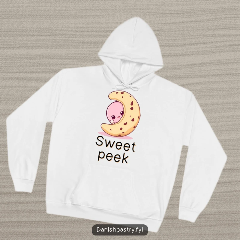 Funny macaroon character curiously peeking from behind a cookie, featured on a cozy and hilarious dessert hoodie.