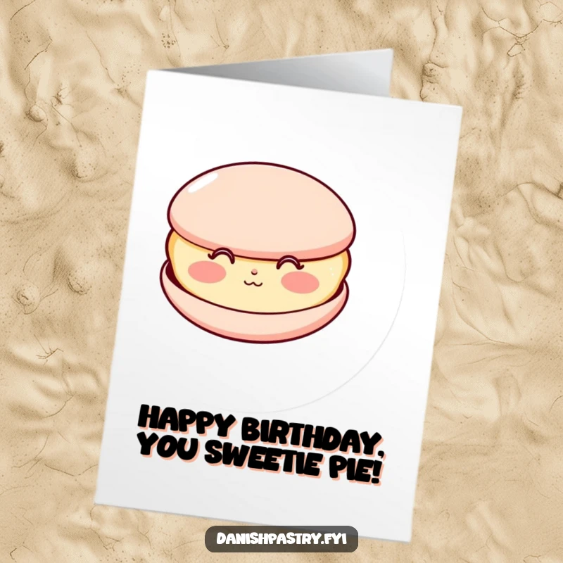 Funny Free Printable Birthday Card featuring a happy macaron with rosy cheeks blowing a kiss, sending sweet birthday wishes.