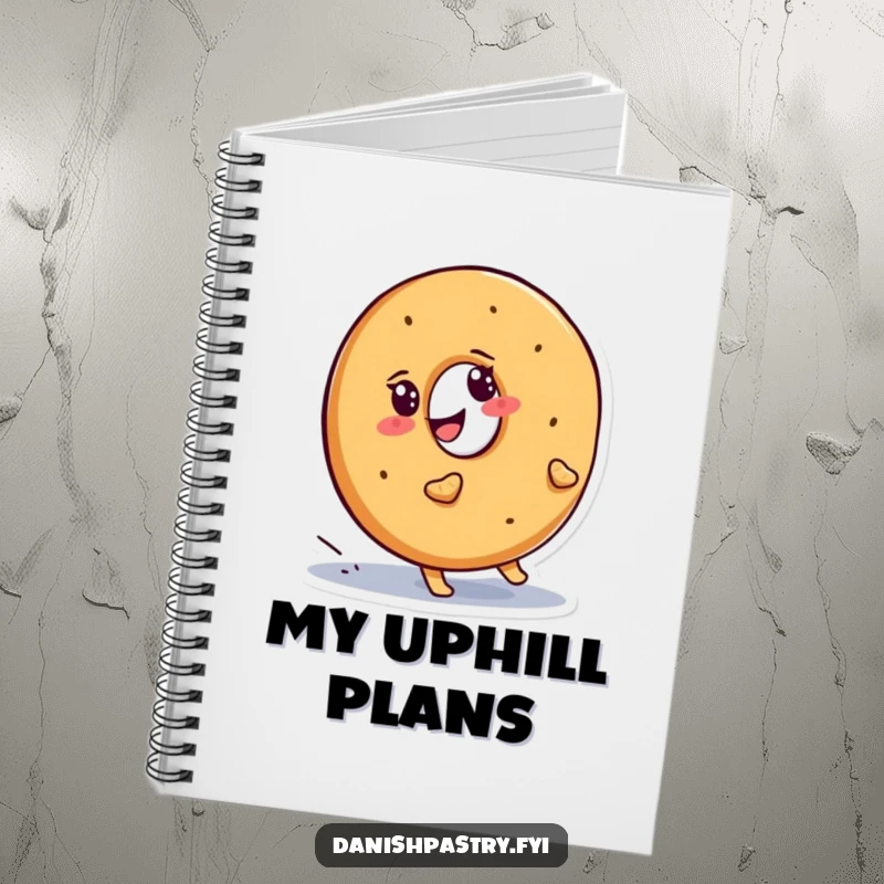 Funny bagel notebook, a smiling character determinedly waddling uphill, perfect for jotting down ambitious goals.