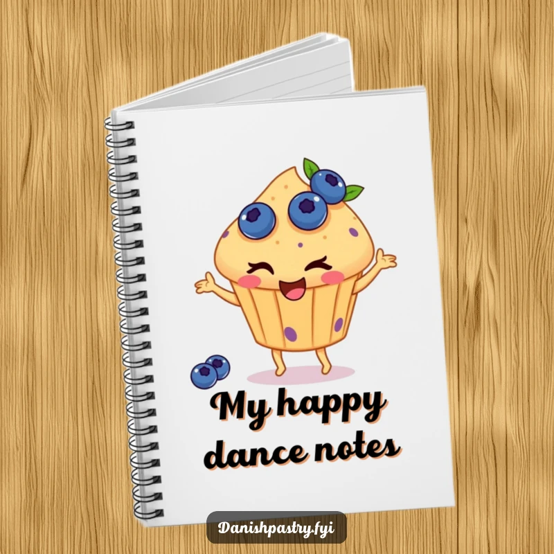 Funny notebook with a winking muffin with blueberries, happily dancing, perfect for jotting notes with a dose of charming, sweet, baking-themed humor.