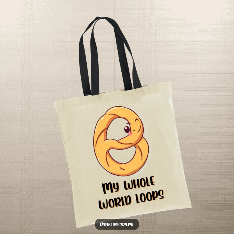 Funny tote bag showcasing a happy pretzel with a grin, captured mid-spin. Humorous snack art carrier.