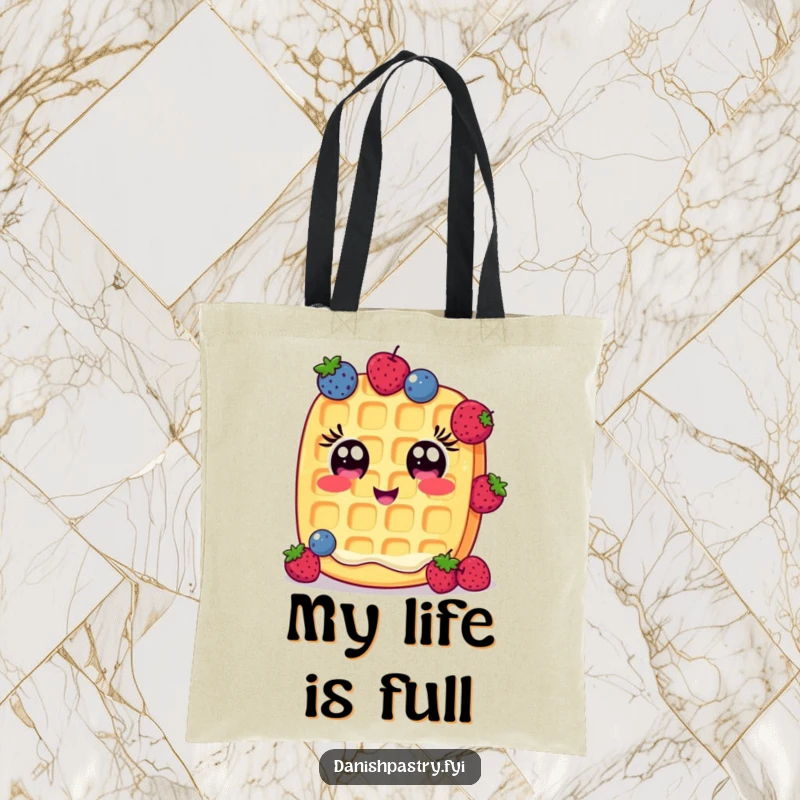 Funny Tote Bag: A cheerful waffle with wide eyes humorously juggles small berries, a whimsical and practical accessory.