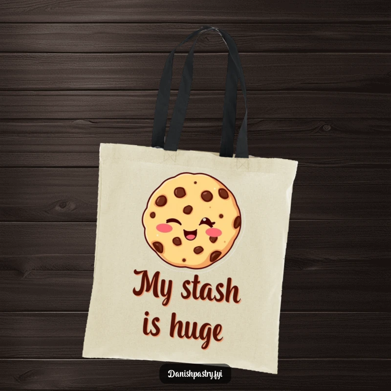 Funny tote bag showcasing a giggling chocolate chip cookie with a playful wink, perfect for everyday use and a humorous statement.